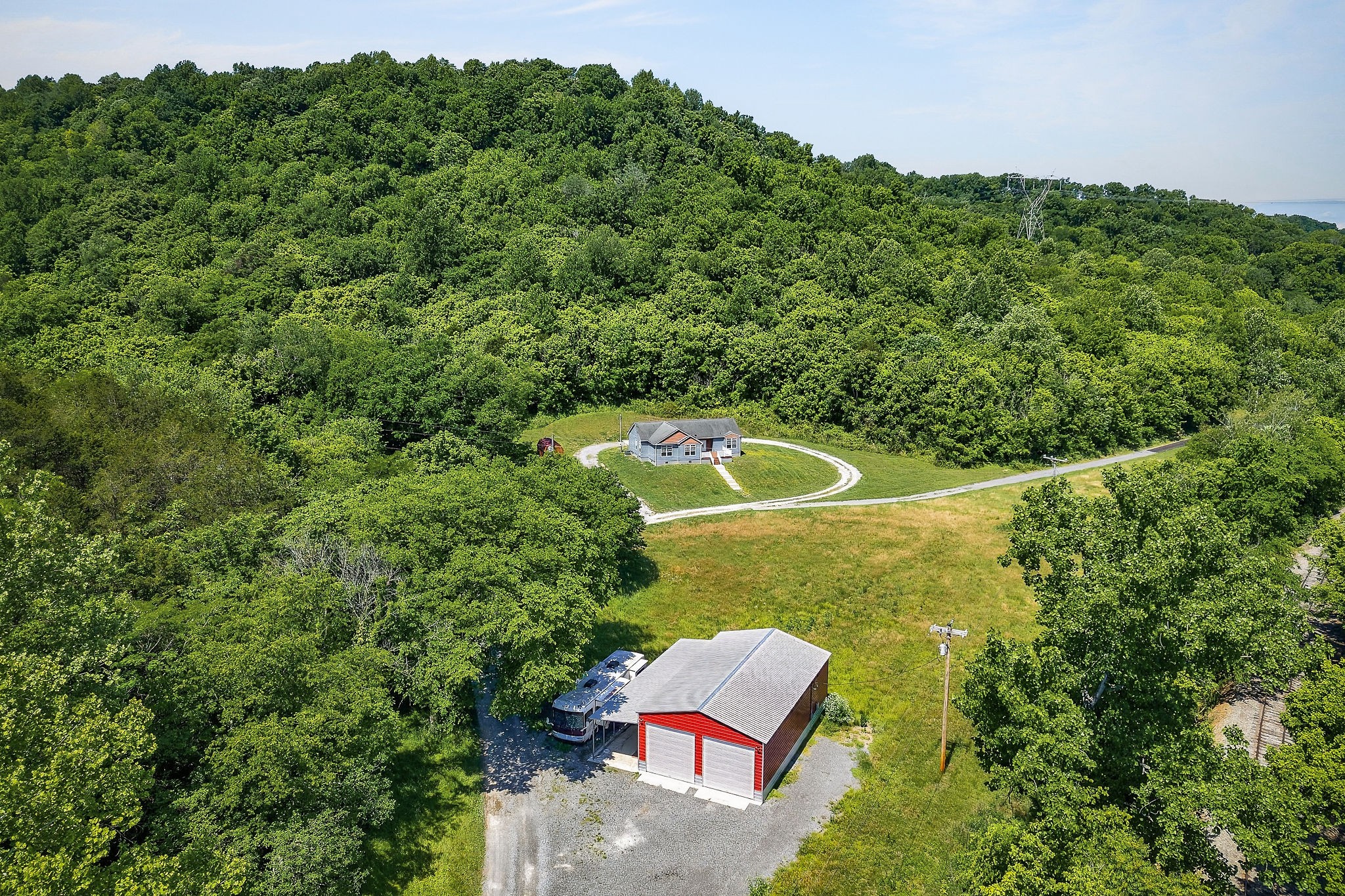 16130 Buffalo Valley Road Silver Point, TN 38582 - Photo 2 of 47 an aerial view of a house with a yard