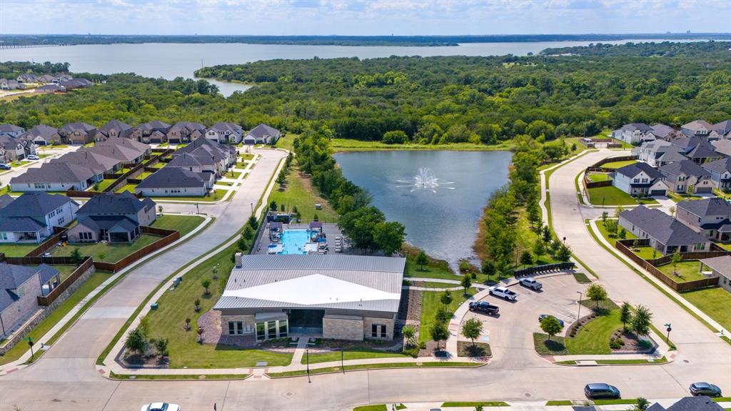 313 Savannah Lane Oak Point, TX 75068 - Photo 27 of 39 Aerial view of residential area featuring a large body of water