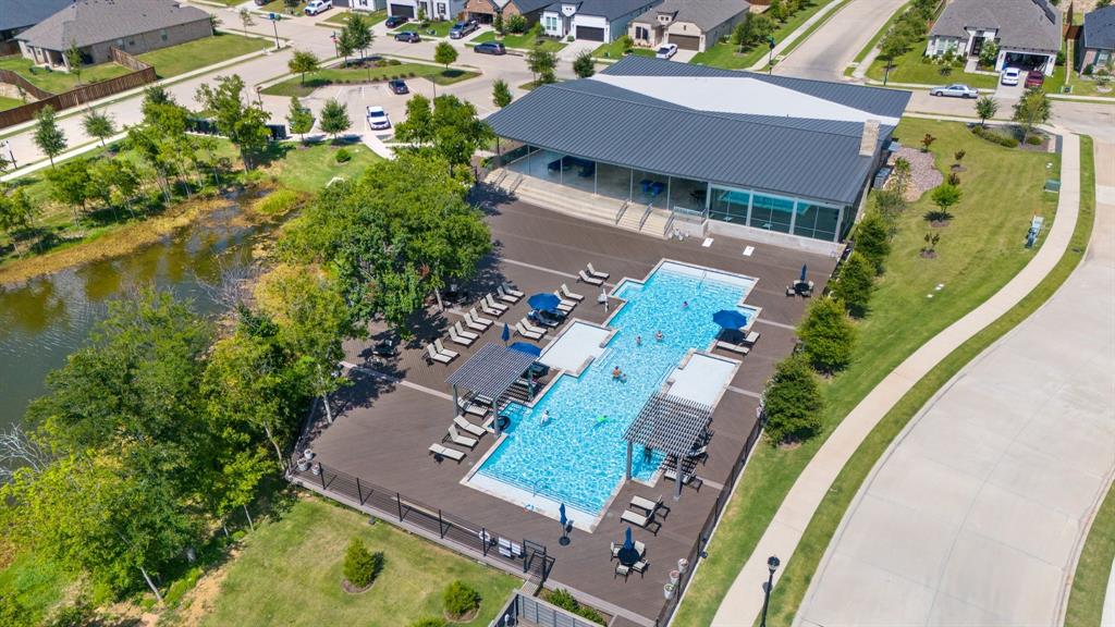 313 Savannah Lane Oak Point, TX 75068 - Photo 30 of 39 Aerial perspective of suburban area featuring a pool