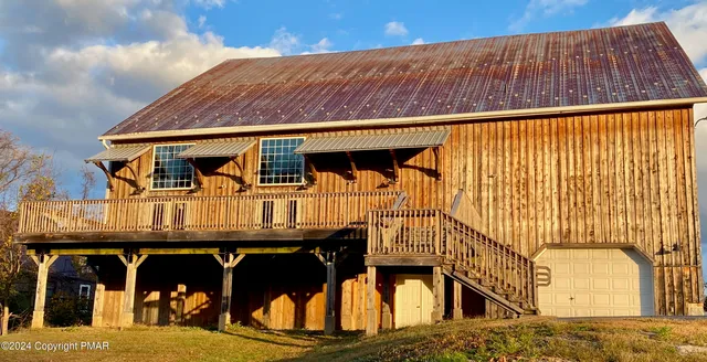 a view of a terrace with a lake view