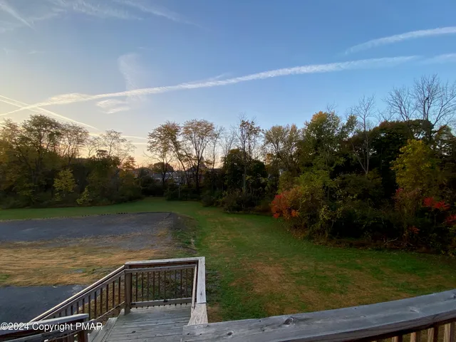 a view of water heater room with stairs