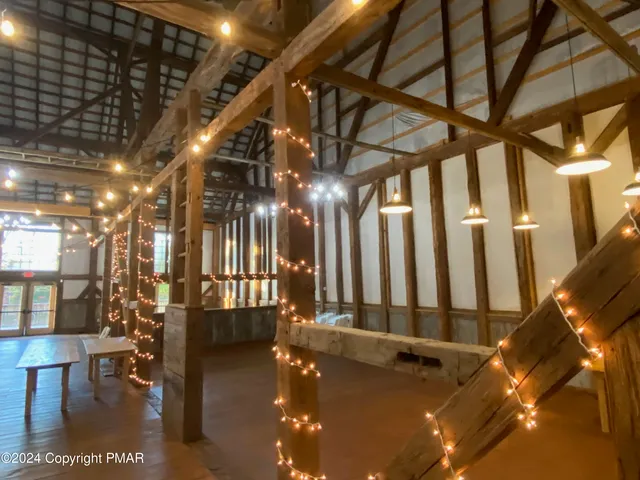 a gym with lots of glass windows and walls