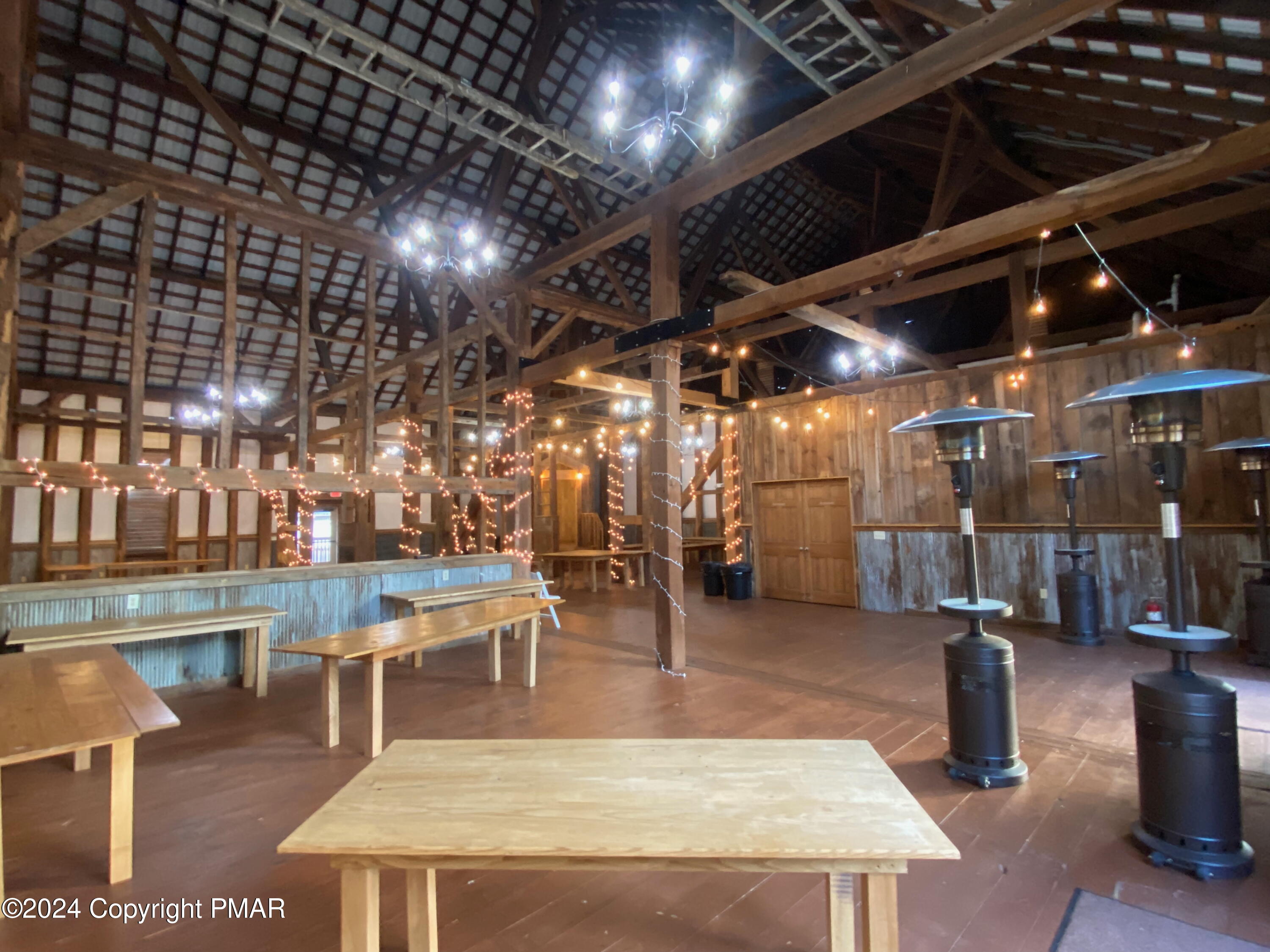 10491 River Road New Columbia, PA 17856 - Photo 29 of 72 a view of a swimming pool with outdoor seating