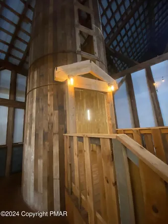 a kitchen with granite countertop a sink a counter top space stainless steel appliances and cabinets