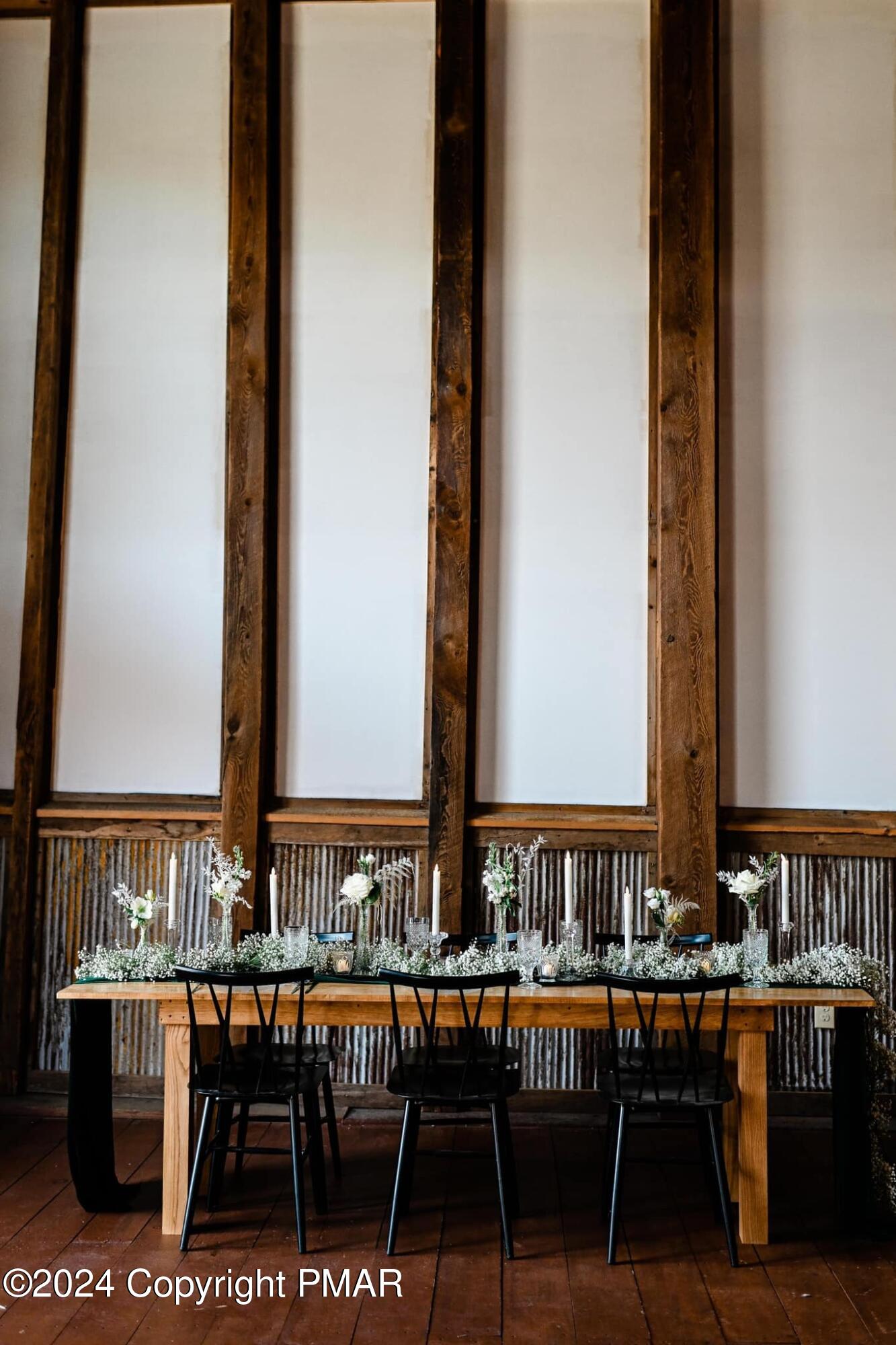10491 River Road New Columbia, PA 17856 - Photo 36 of 72 a view of a kitchen with dining room and chairs