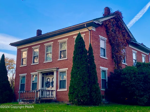 a bathroom with a sink vanity and mirror