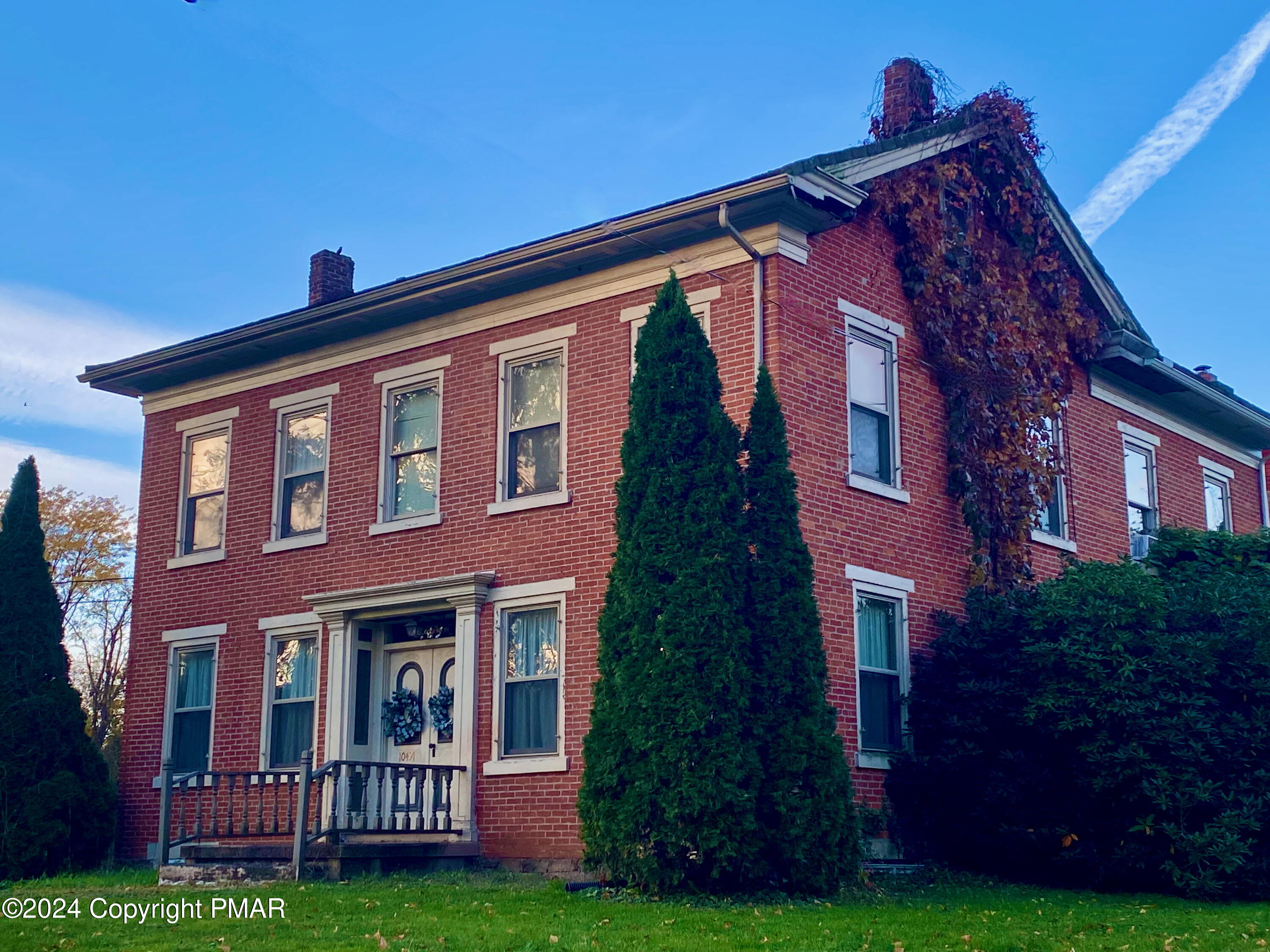10491 River Road New Columbia, PA 17856 - Photo 45 of 72 a front view of a house with garden