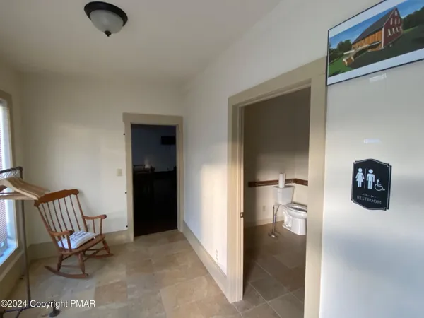 a bathroom with a bathtub and shower