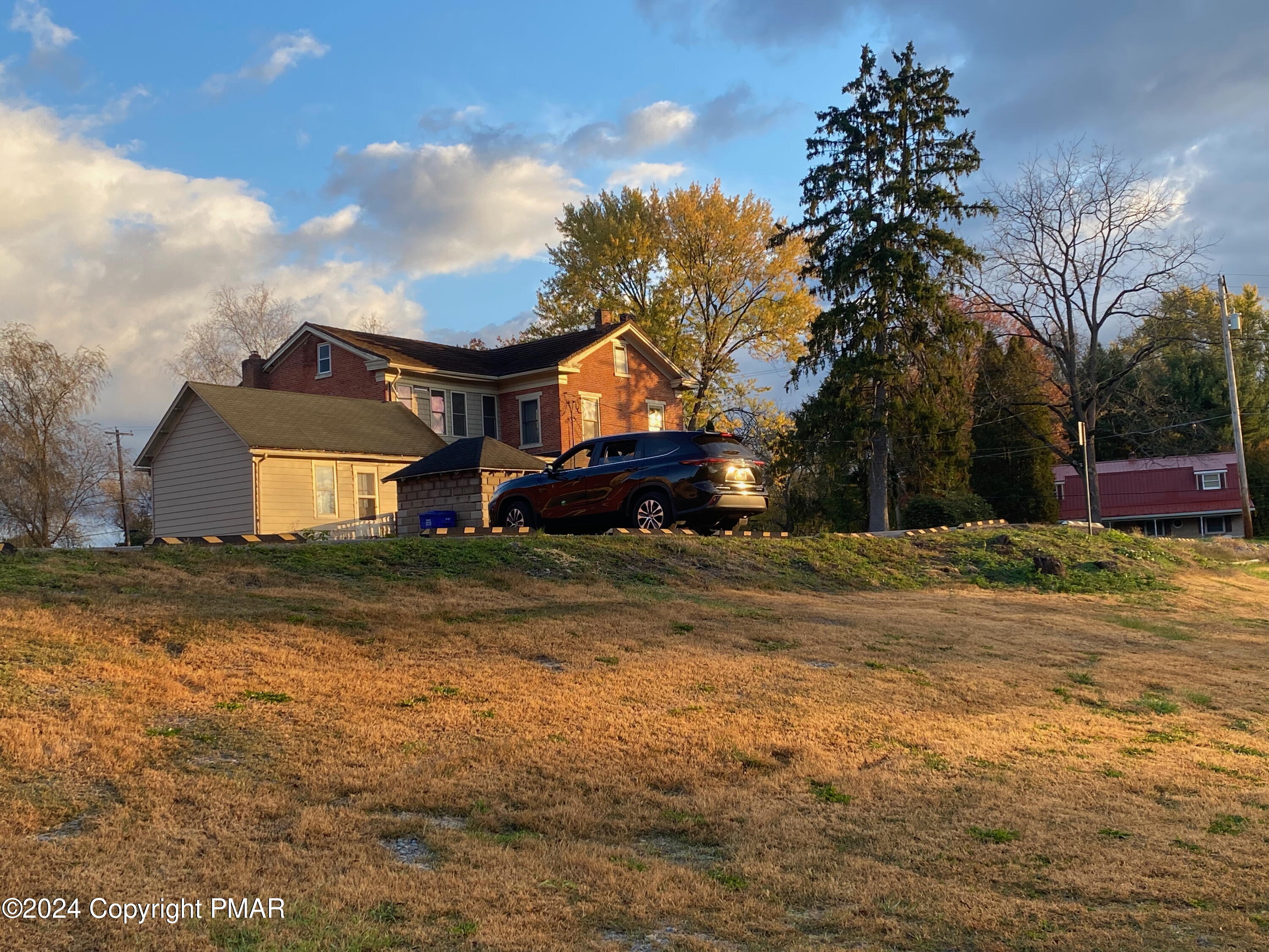 10491 River Road New Columbia, PA 17856 - Photo 47 of 72 a front view of house with yard