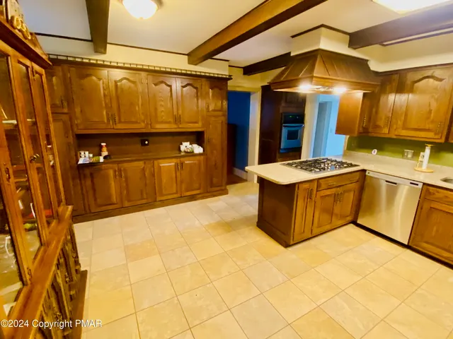 a bathroom with a sink and a shower