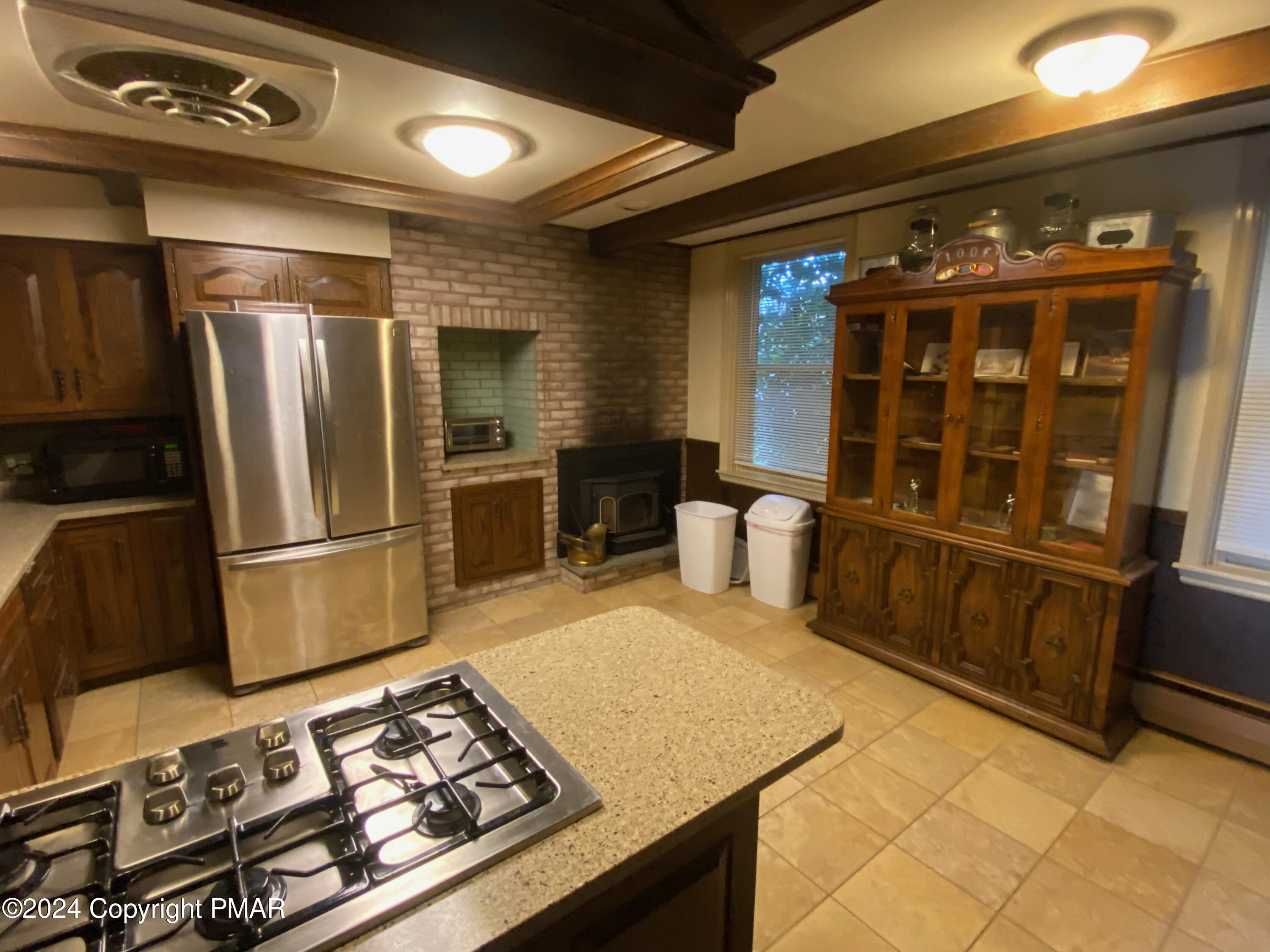 10491 River Road New Columbia, PA 17856 - Photo 51 of 72 a kitchen with stainless steel appliances granite countertop a refrigerator and a stove