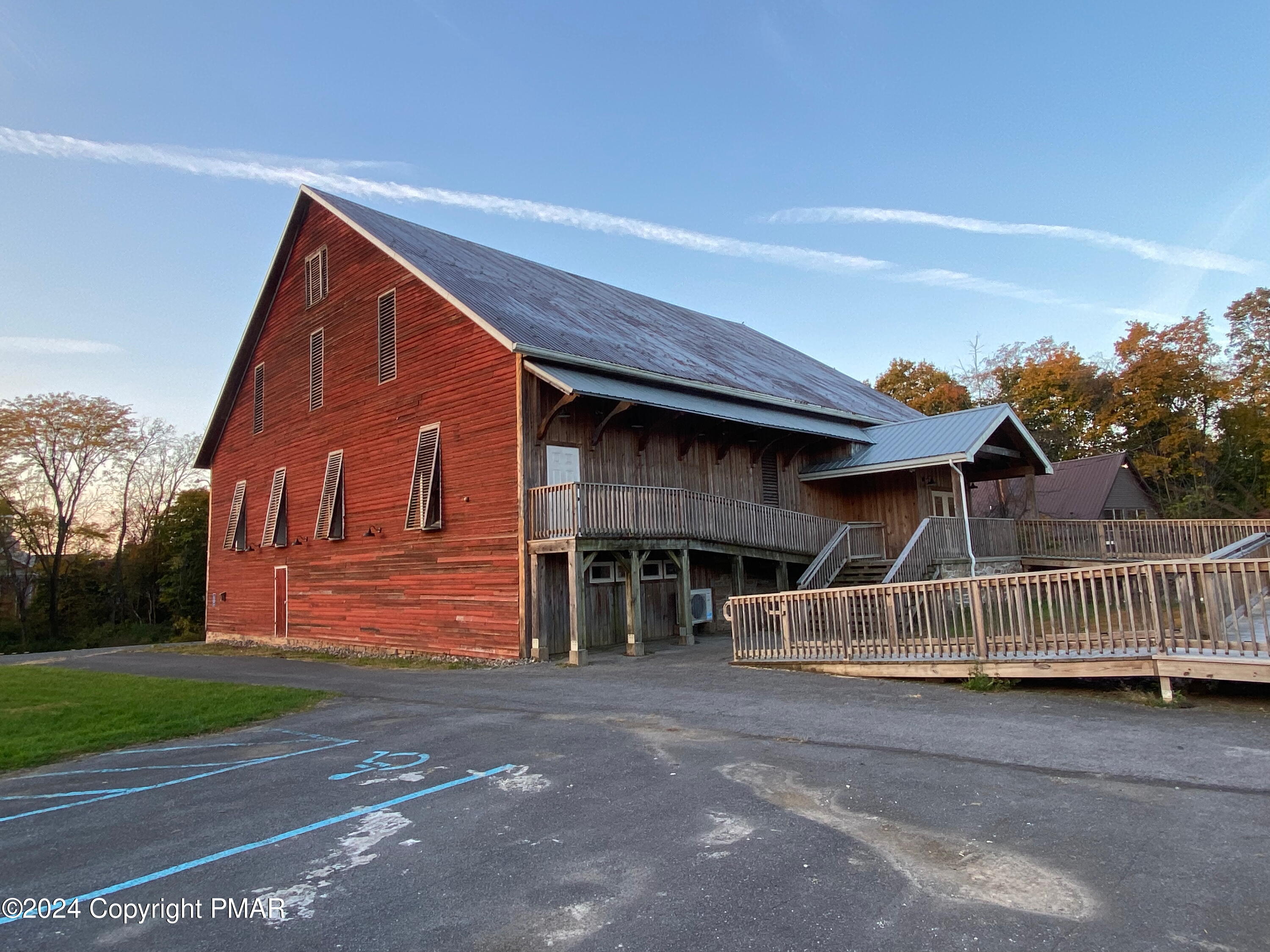 10491 River Road New Columbia, PA 17856 - Photo 6 of 72 a front view of a house with garage