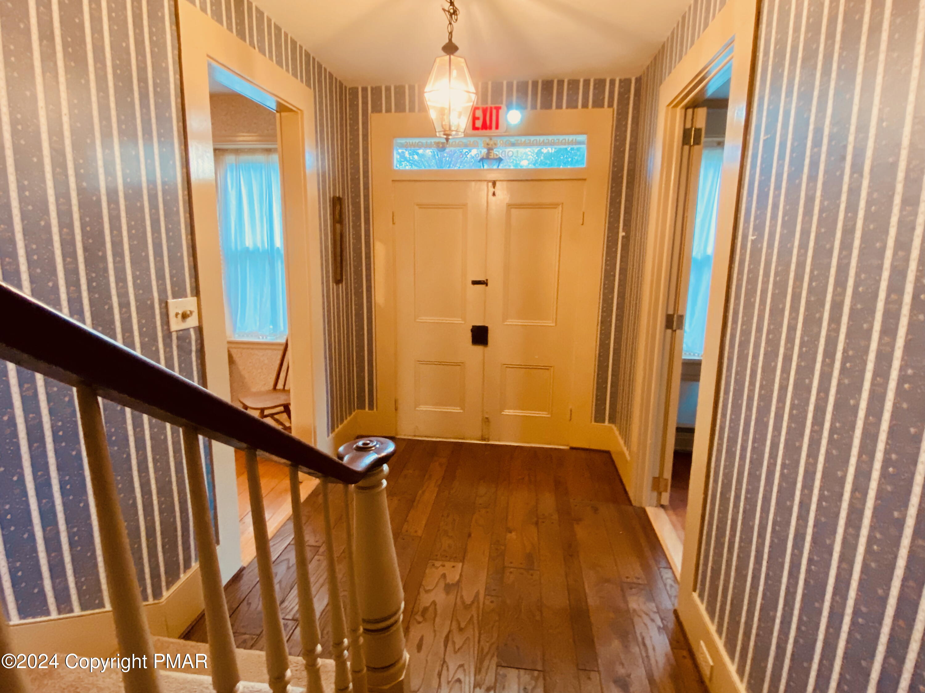 10491 River Road New Columbia, PA 17856 - Photo 64 of 72 a view of a hallway with wooden floor and staircase