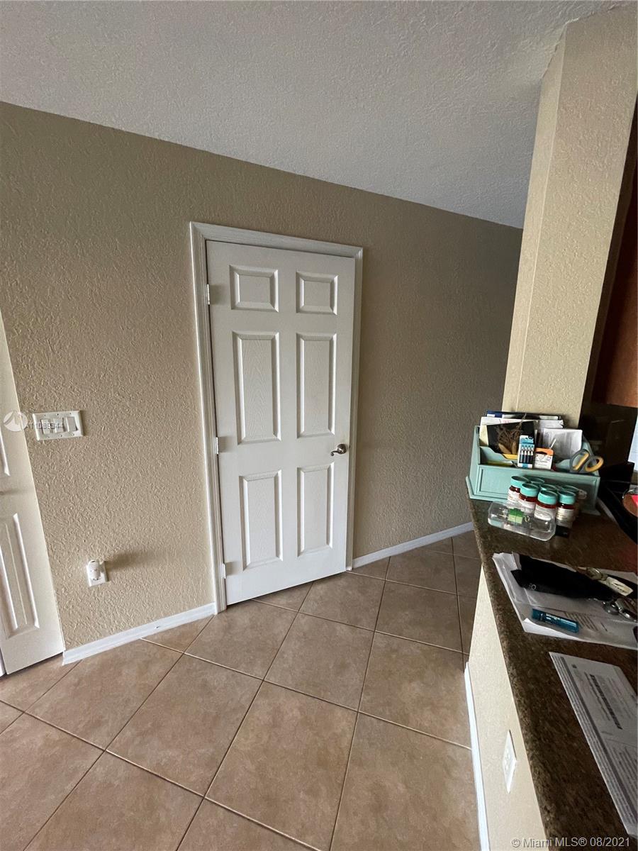 5924 Abbey Road Tamarac, FL 33321 - Photo 12 of 44 a view of a livingroom with an empty space
