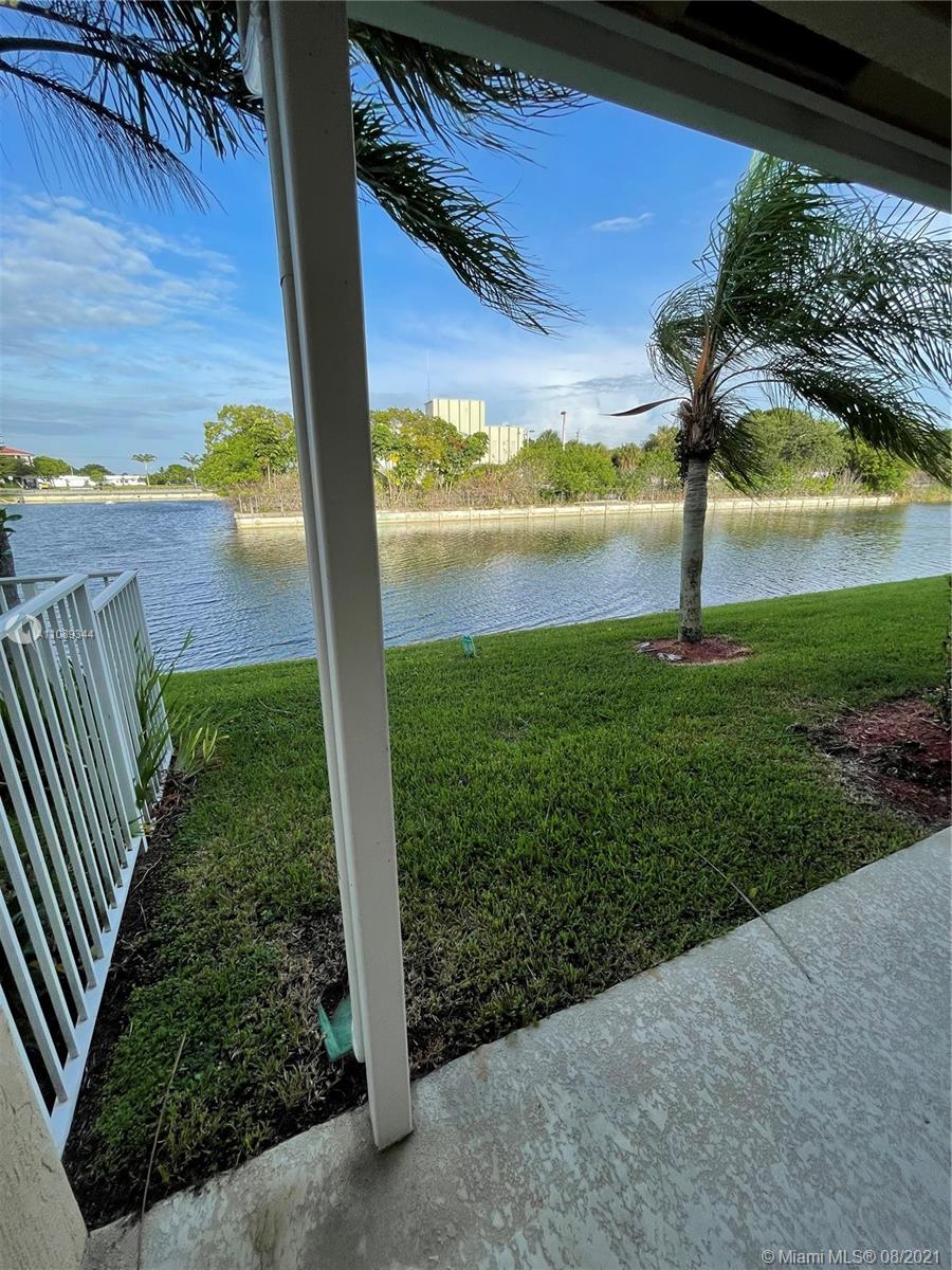 5924 Abbey Road Tamarac, FL 33321 - Photo 17 of 44 a view of a back yard from a balcony