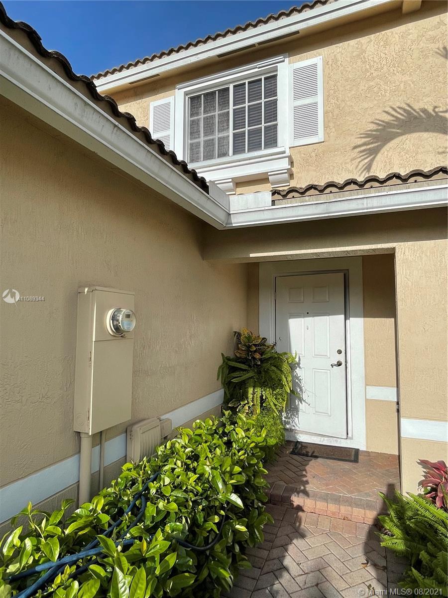 5924 Abbey Road Tamarac, FL 33321 - Photo 3 of 44 a house view with a outdoor space