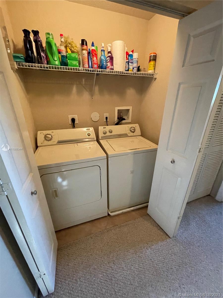 5924 Abbey Road Tamarac, FL 33321 - Photo 38 of 44 a utility room with dryer and washer