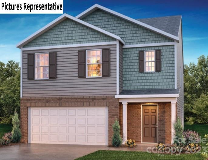 5035 Fandango Road York, SC 29745 - Photo 1 of 35 a front view of a house with garden