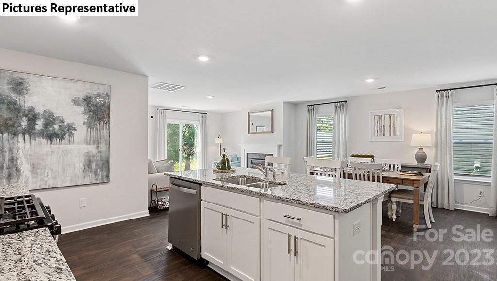 5035 Fandango Road York, SC 29745 - Photo 12 of 35 a kitchen with granite countertop a sink and a stove in it
