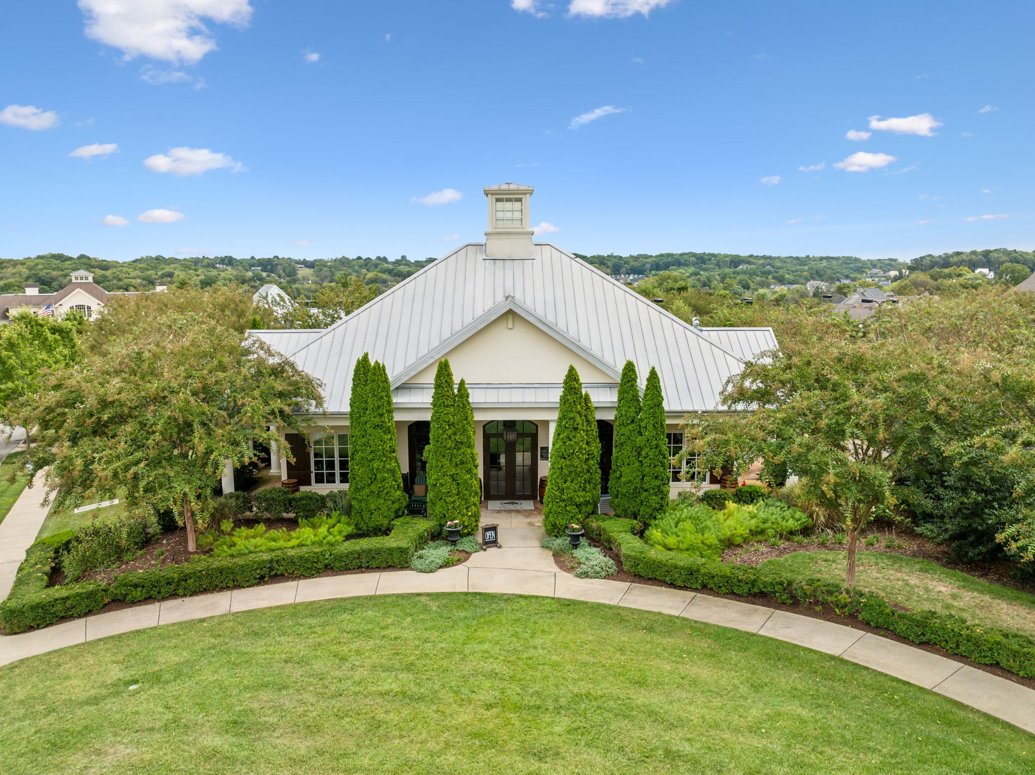 8809 Drosera Circle College Grove, TN 37046 - Photo 87 of 88 a front view of a house with a yard