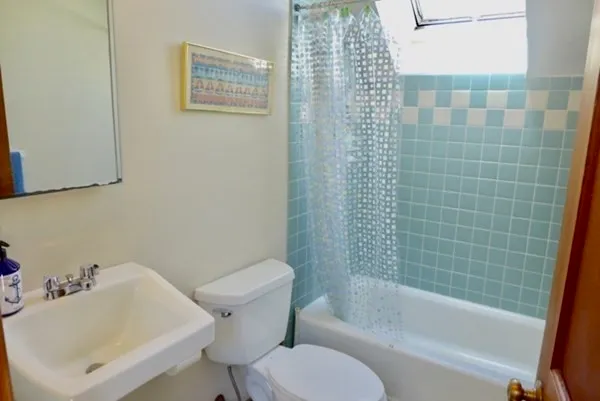 a view of a table and chairs in the garden