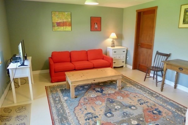 31 South Ridge Road Chilmark, MA 02535 - Photo 8 of 20 a living room with furniture and a wooden floor