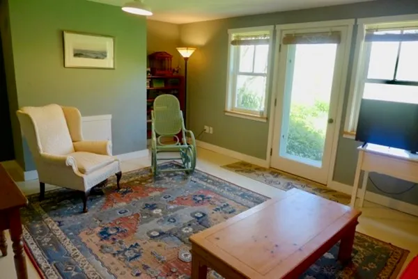a living room with a couch and a table