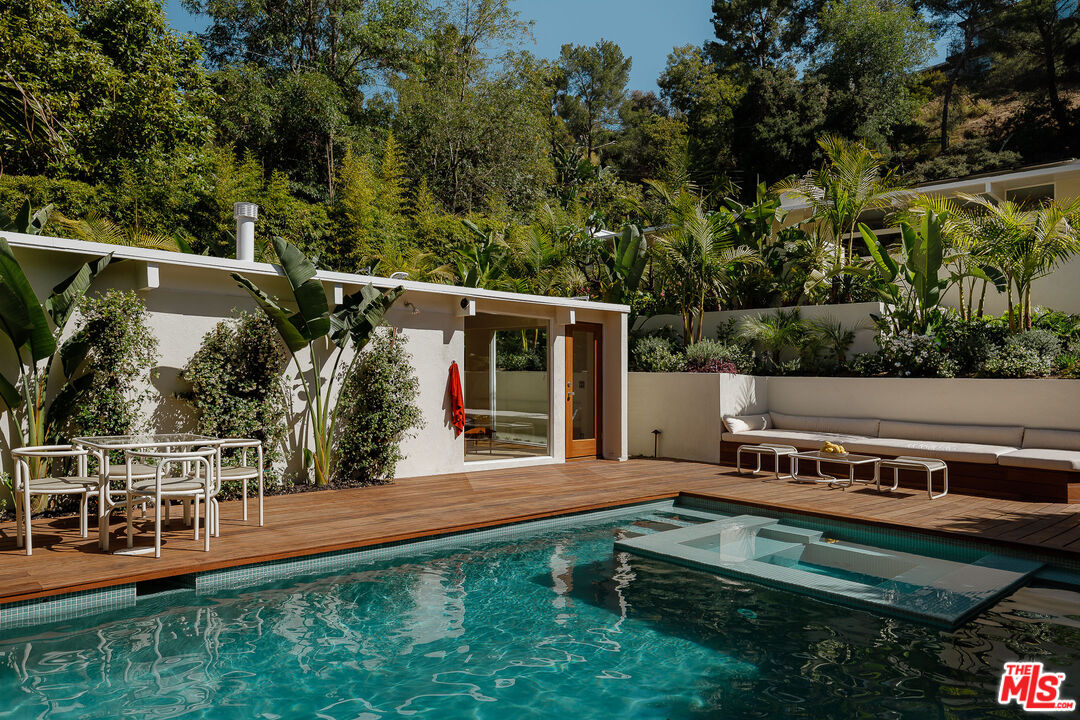 2544 Greenvalley Road Los Angeles, CA 90046 - Photo 43 of 56 a view of a house with backyard sitting area and garden