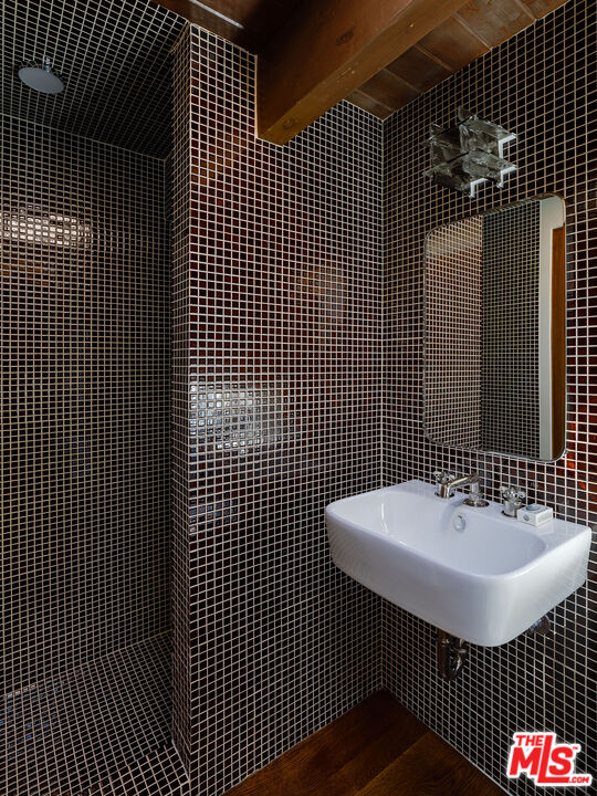 2544 Greenvalley Road Los Angeles, CA 90046 - Photo 46 of 56 a bathroom with a sink toilet and shower