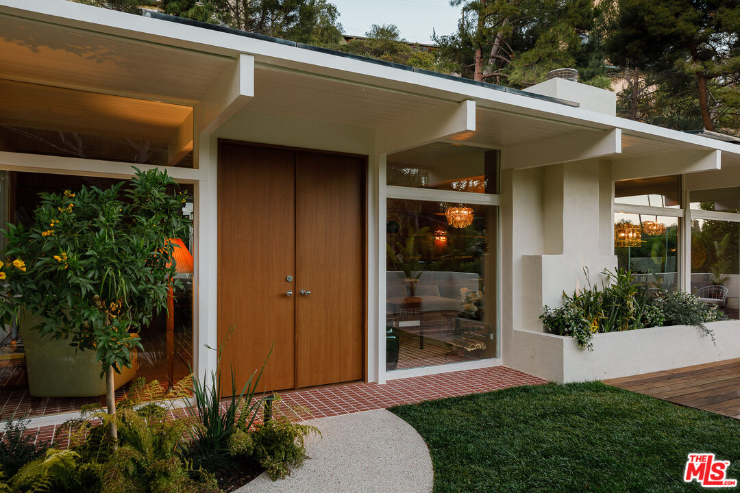 2544 Greenvalley Road Los Angeles, CA 90046 - Photo 54 of 56 a view of a porch with a yard