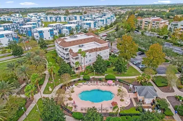 an aerial view of residential house with outdoor space
