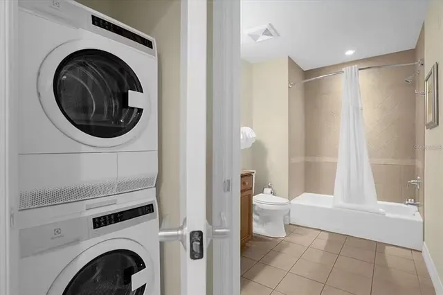 a view of a hallway with washer and dryer