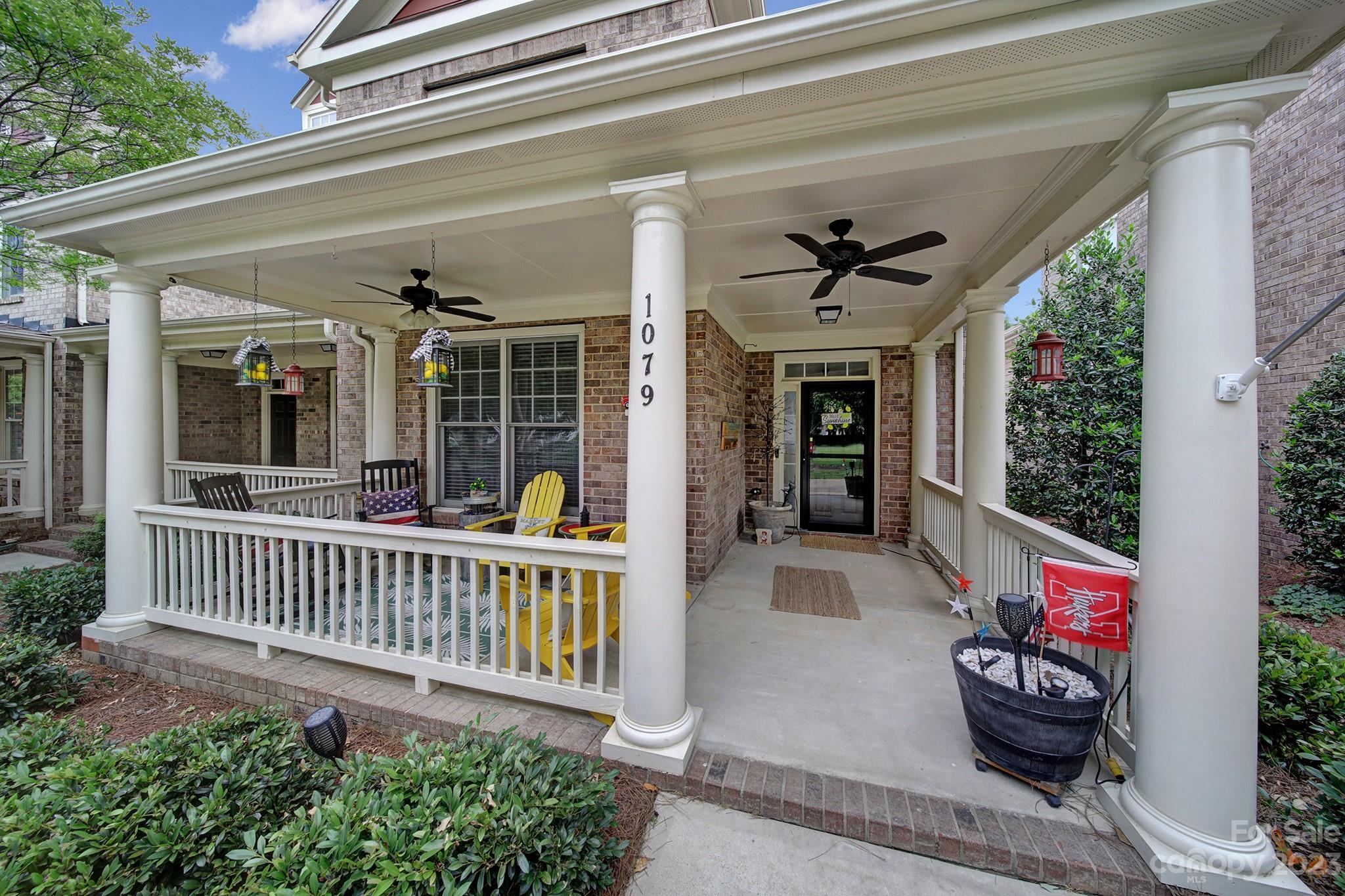 1079 Market Street Fort Mill, SC 29708 - Photo 2 of 46 a view of a house with porch and wooden floor