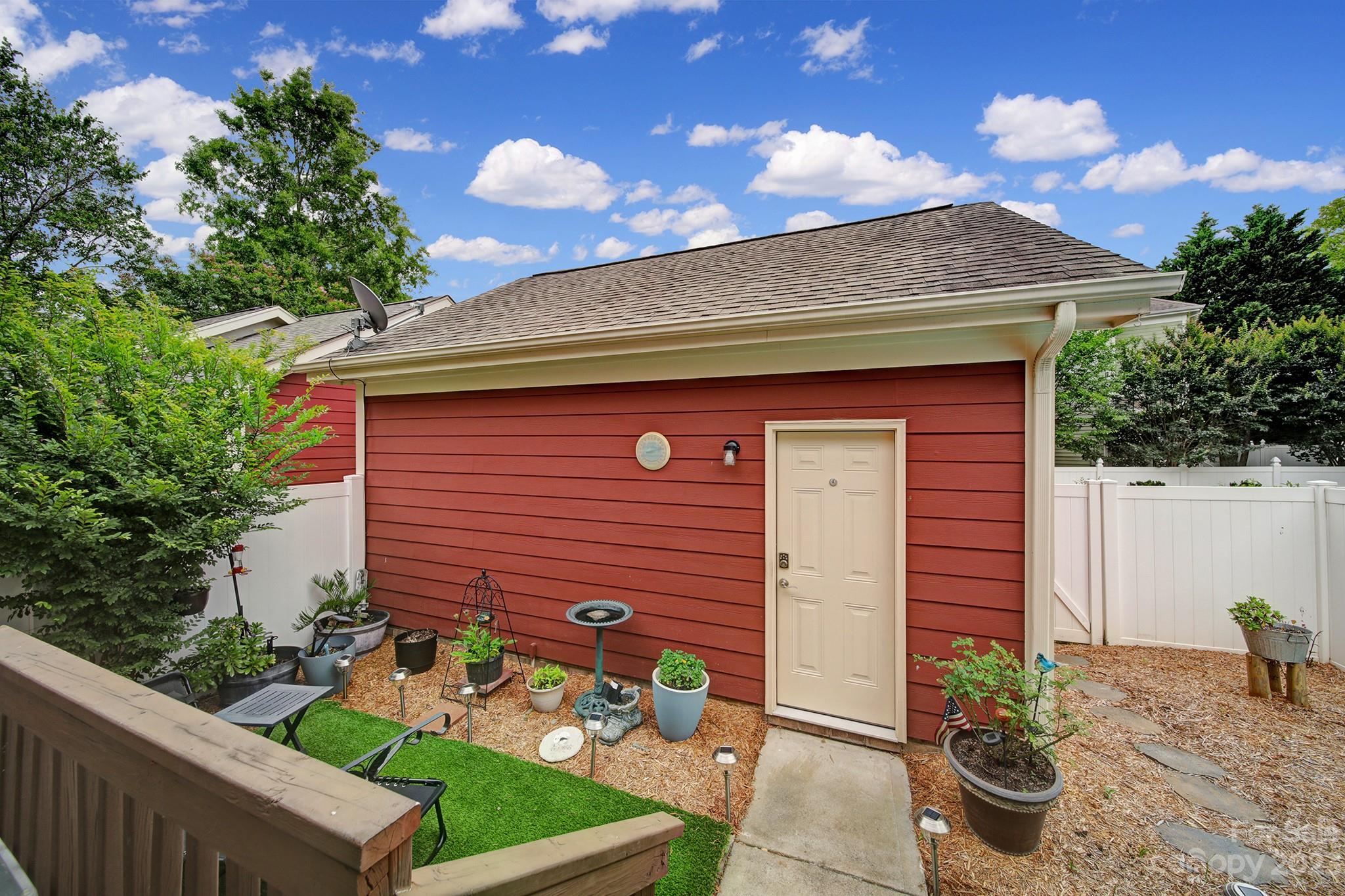 1079 Market Street Fort Mill, SC 29708 - Photo 27 of 46 a front view of a house with garden