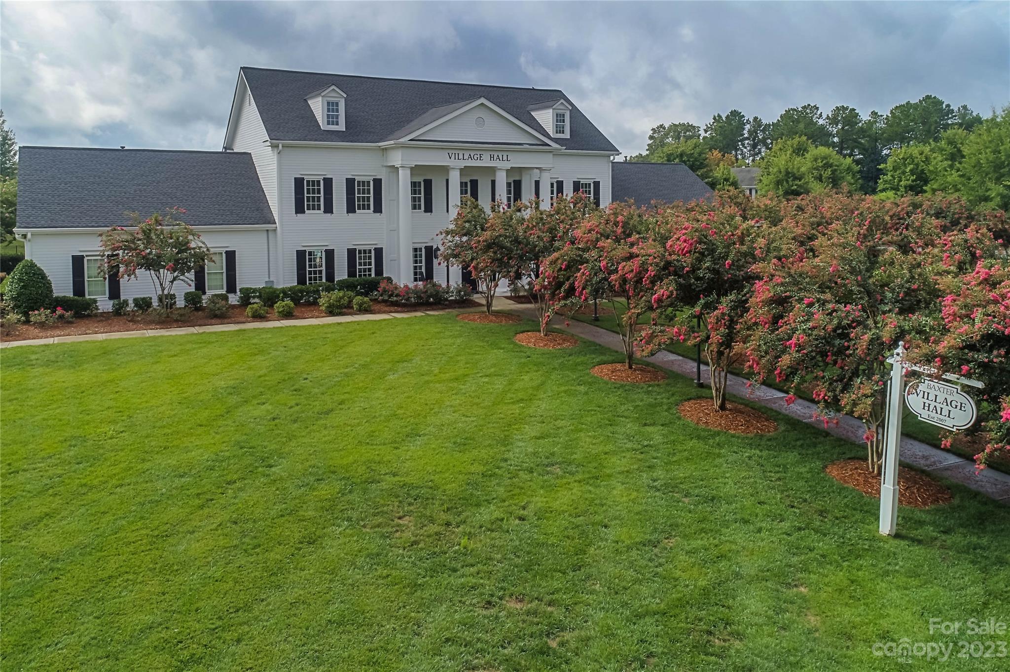 1079 Market Street Fort Mill, SC 29708 - Photo 36 of 46 a front view of a house with a garden
