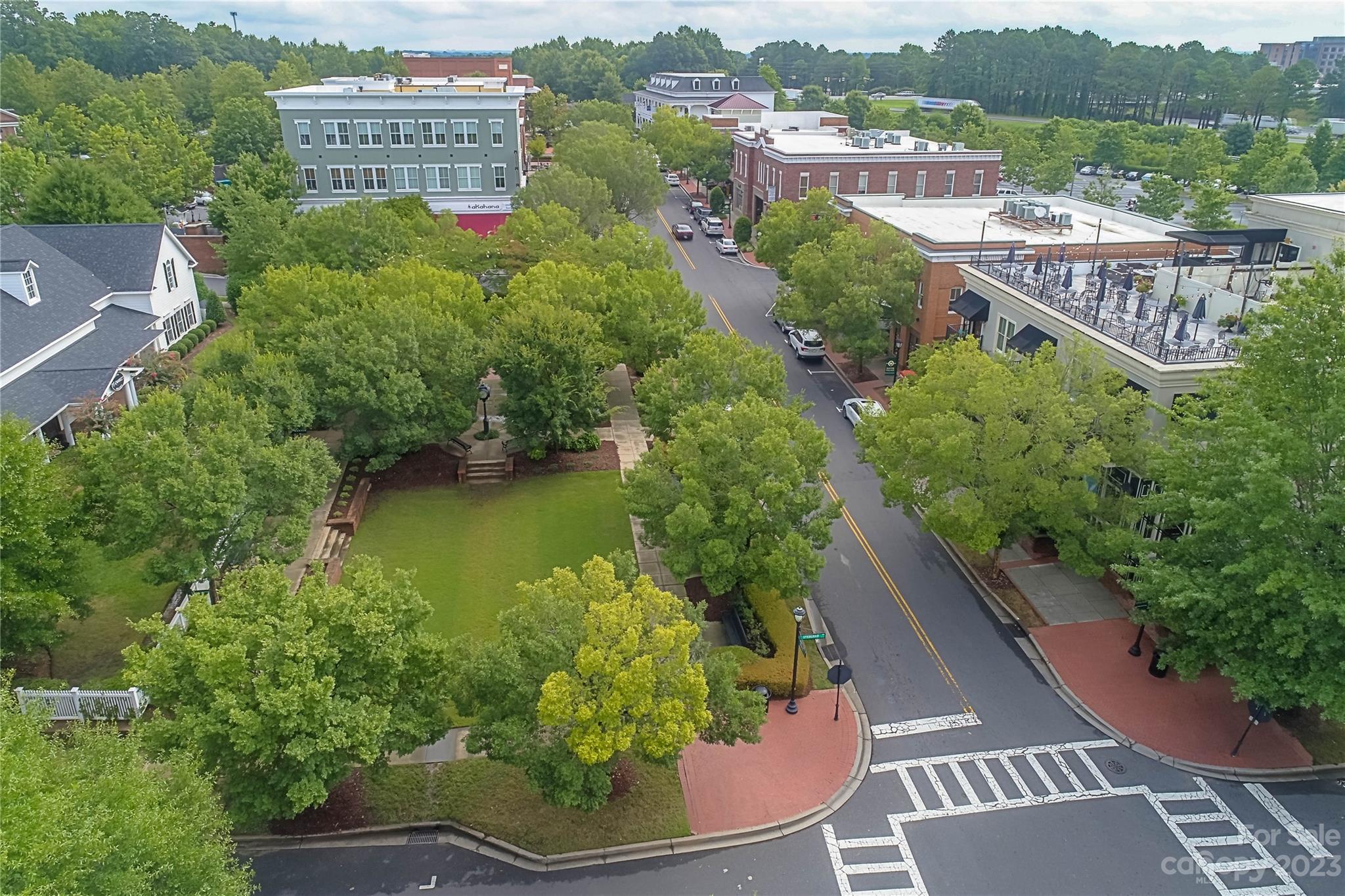 1079 Market Street Fort Mill, SC 29708 - Photo 44 of 46 a view of a lake with a building in the background