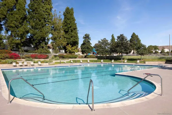 a view of a swimming pool with a lake