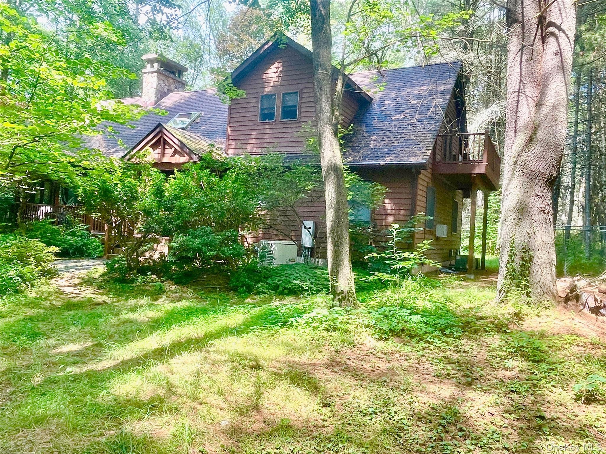 111 Deer Meadow Road Bethel, NY 12786 - Photo 2 of 43 a backyard of a house with lots of green space