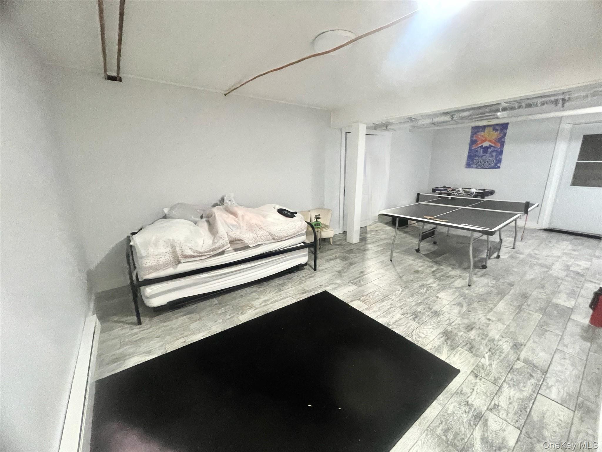 111 Deer Meadow Road Bethel, NY 12786 - Photo 25 of 43 a living room with furniture and a rug