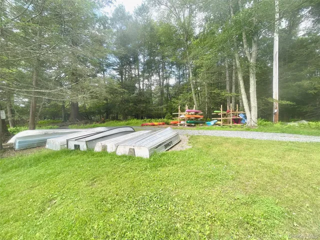 a view of a playground with basketball court