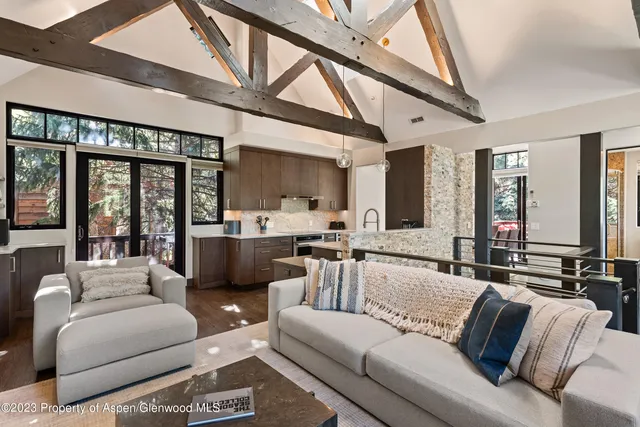 a living room with furniture or outdoor view and a large window