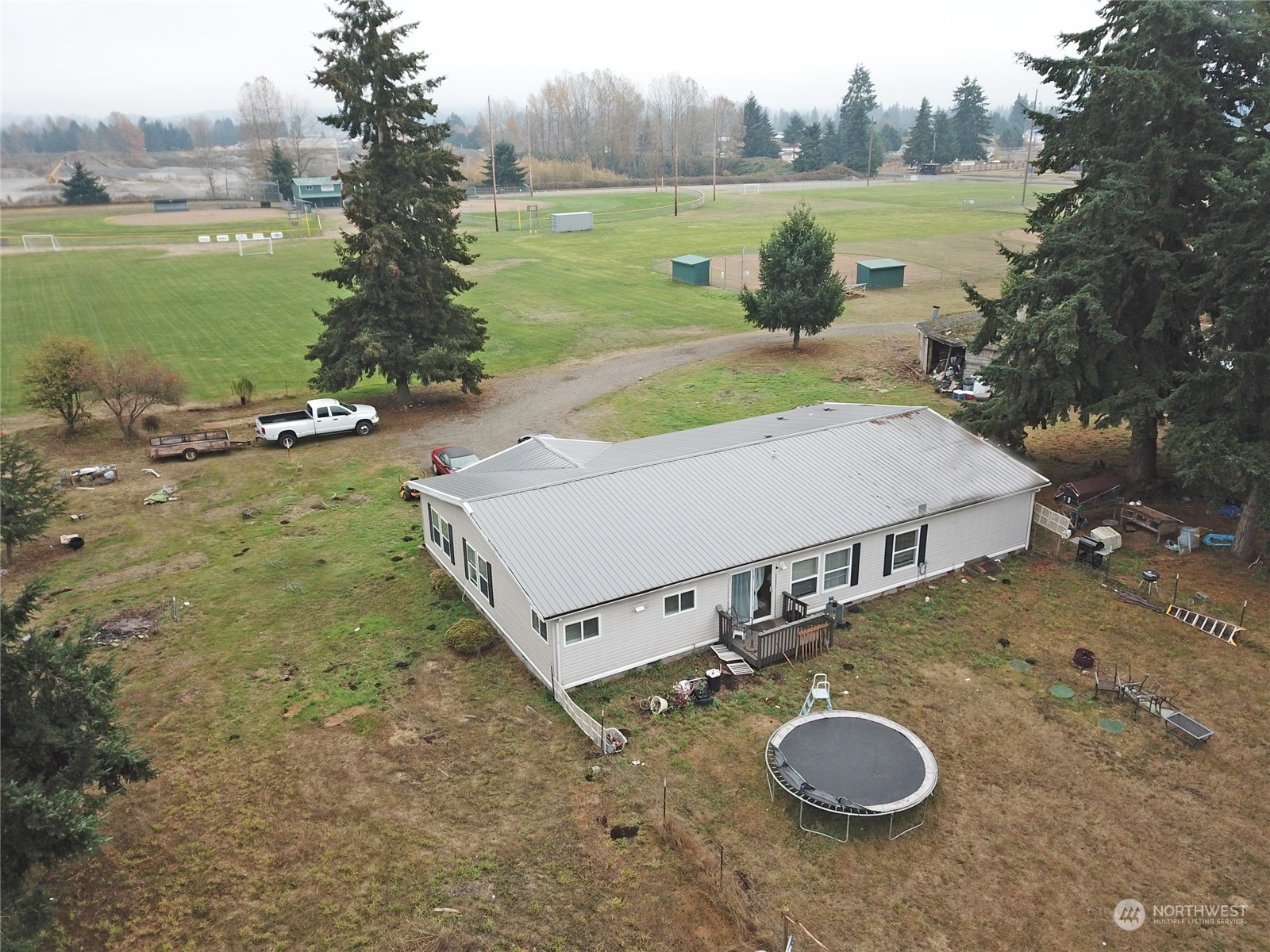 7130 196th Avenue Southwest Rochester, WA 98579 - Photo 2 of 36 a view of a lake with a yard
