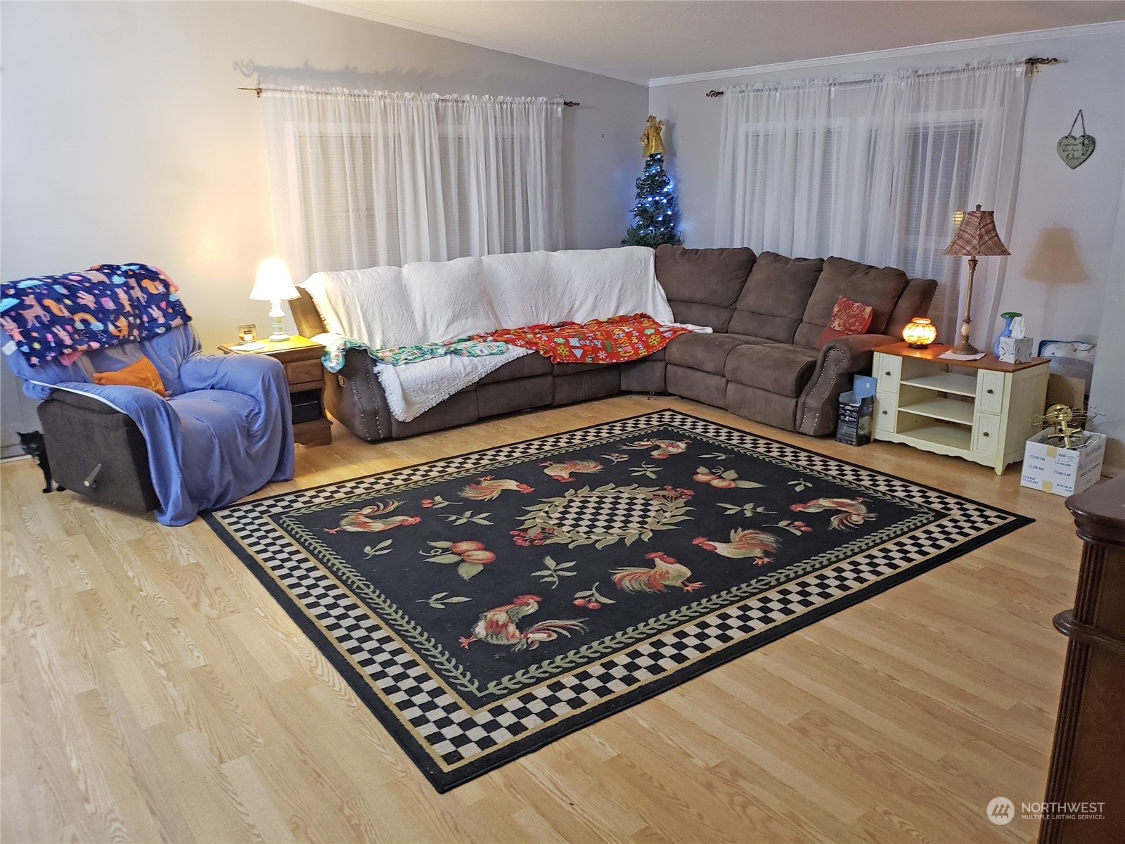 7130 196th Avenue Southwest Rochester, WA 98579 - Photo 21 of 36 a living room with furniture rug and a window