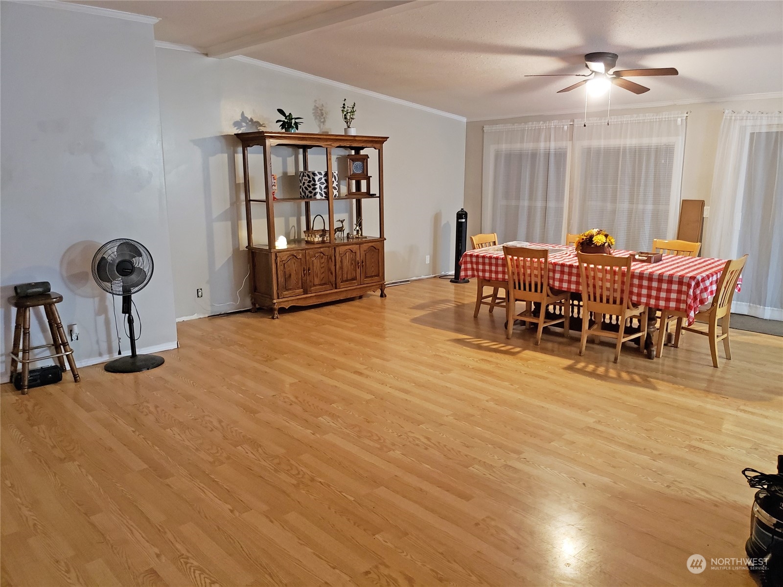 7130 196th Avenue Southwest Rochester, WA 98579 - Photo 22 of 36 a view of a dining room with furniture and a chandelier