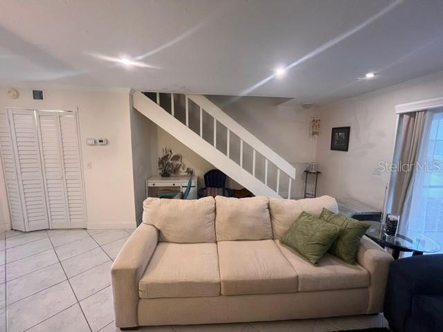 1614 Stickney Point Road, Unit 102 Sarasota, FL 34231 - Photo 16 of 34 a living room with furniture and a window