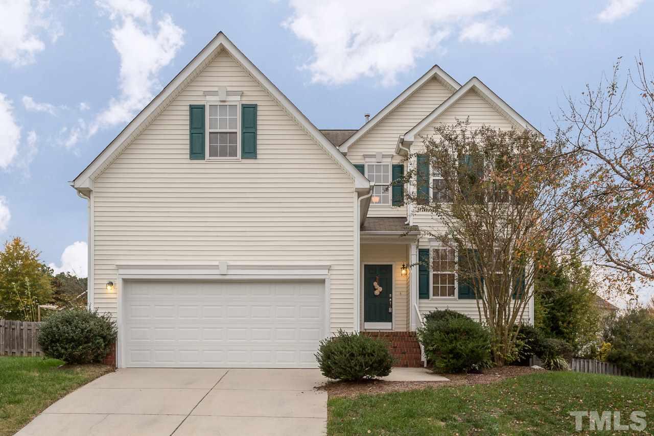 12516 Garden Tree Lane Raleigh, NC 27614 - Photo 1 of 25 a view of a white house next to a yard and trees