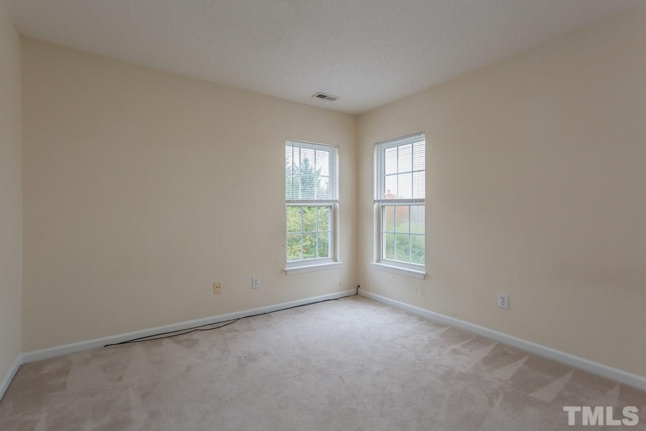 12516 Garden Tree Lane Raleigh, NC 27614 - Photo 16 of 25 an empty room with windows