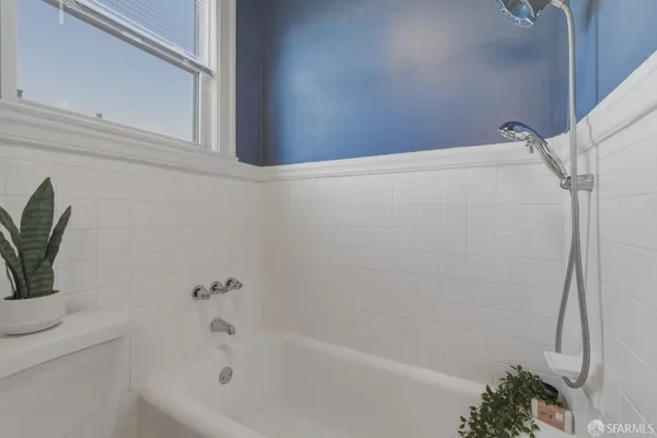 a bathroom with a bathtub