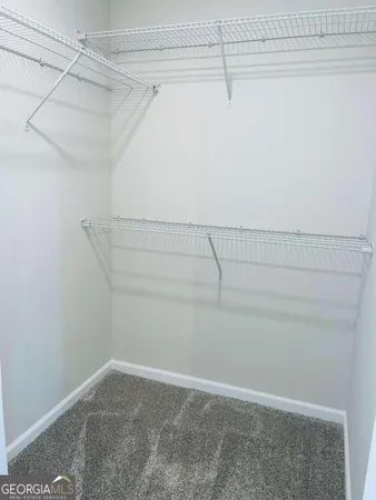 a view of a room with racks on the wall