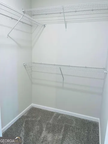 a view of a room with racks on the wall